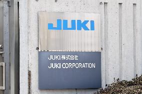 JUKI signboard and logo